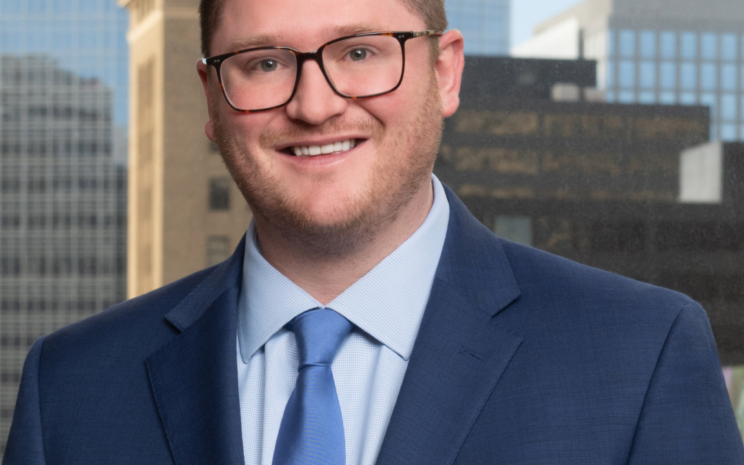 Tucker E. Allen